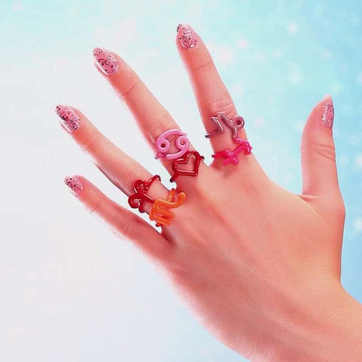 Hotglyph enamel and silver zodiac rings on hand video by Hotlips by Solange