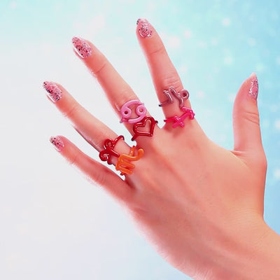 Hotglyph enamel and silver zodiac rings on hand video by Hotlips by Solange